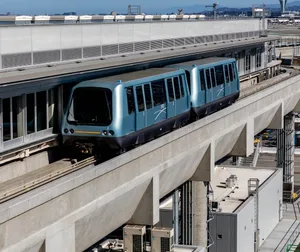 SFO AirTrain arriving at the station 