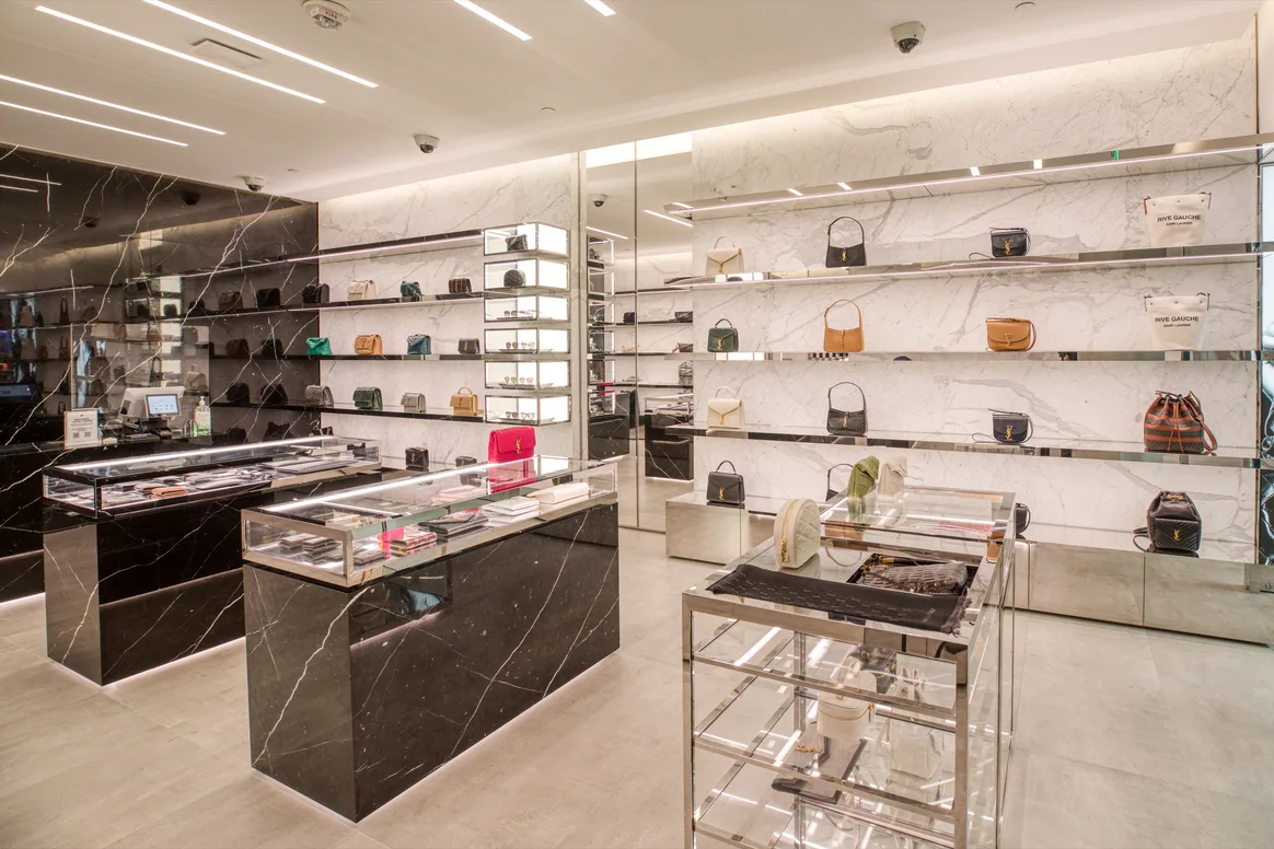 Handbags and leather goods on display at Saint Laurent